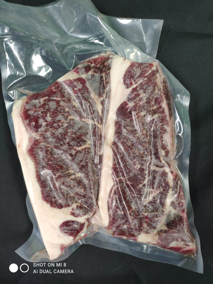 Pasture raised, Dry Aged Striploin Steak, hormone free, antibiotic free, no vaccines raised in Southern Alberta.