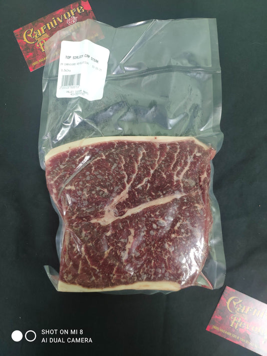 Picanha / Top Sirloin Cap steak dry aged, pasture raised in Southern Alberta.